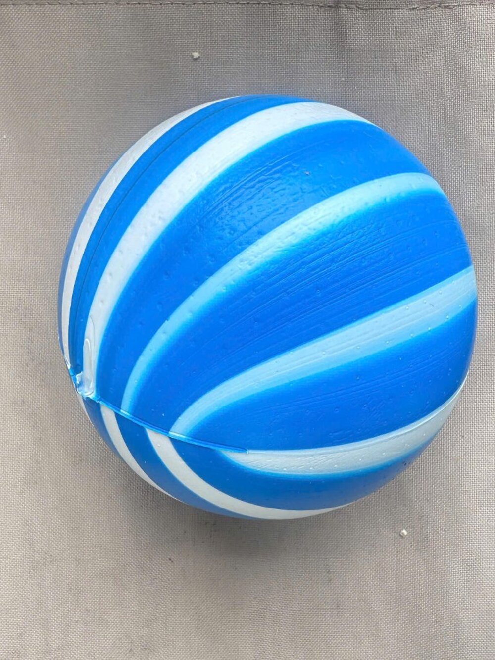 Used Blue & White Striped Toy Ball - Fun for All Ages!